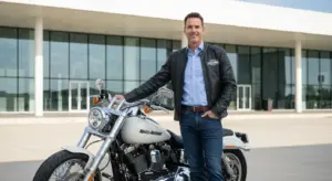 New Harley Davidson CEO Artie Starrs standing