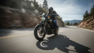 Dynamic rolling shot of a Harley-Davidson X440 at 60 mph on a curved mountain road
